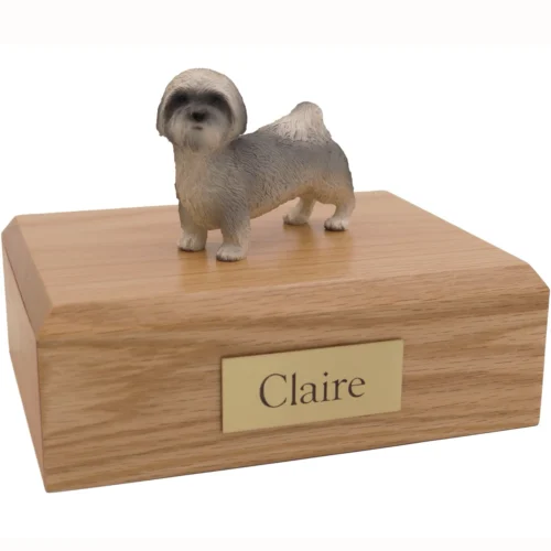 Standing gray puppycut lhasa apso dog figurine on wood cremation urn