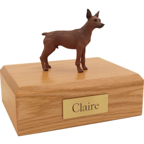 Standing ears up brown red miniature doberman pinscher dog figurine on wood cremation urn