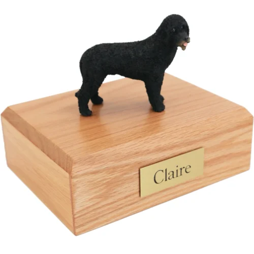 Standing Portuguese Water Dog figurine on wood cremation urn