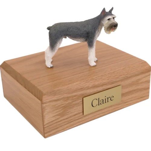 Standing gray Giant Schnauzer dog figurine on wood cremation urn