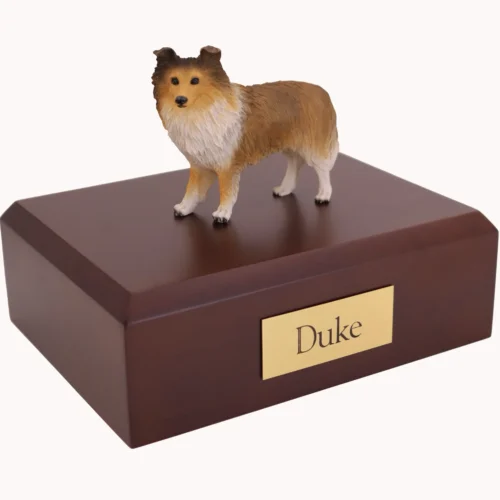 Standing sable Sheltie Shetland Sheepdog dog figurine on wood cremation urn