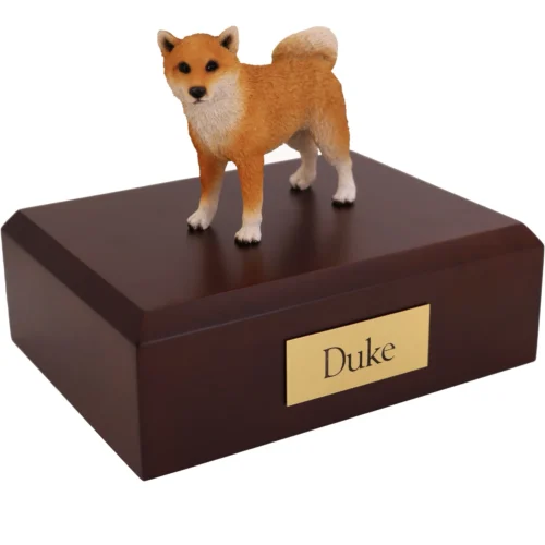 Standing Shiba dog figurine on wood cremation urn