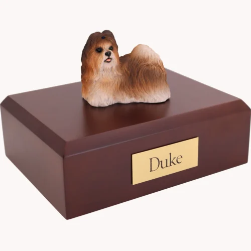 Standing red and white shih tzu dog figurine on wood cremation urn
