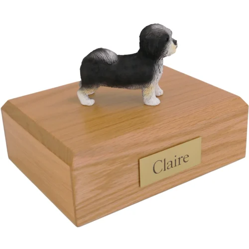 Standing black and white puppycut shih tzu dog figurine on wood cremation urn