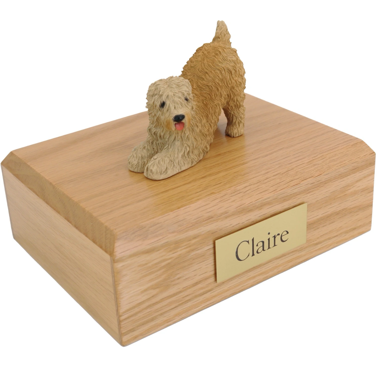 Soft coated wheaten dog figurine on wood cremation urn