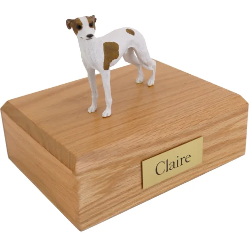 Standing white and brown whippet dog figurine on wood cremation urn