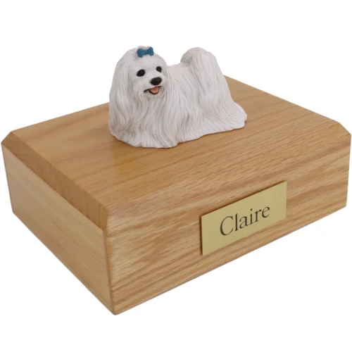 Maltese dog figurine on wood cremation urn