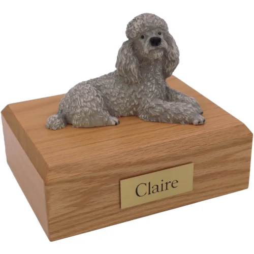 Laying gray Poodle dog figurine wood memorial cremation urn