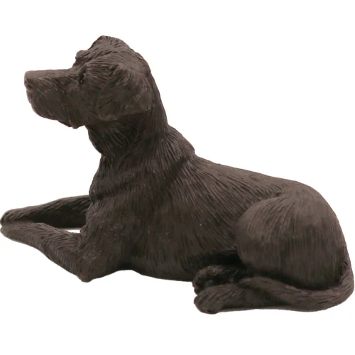 Laying chocolate Labrador Retriever dog figurine for cremation urn, side view