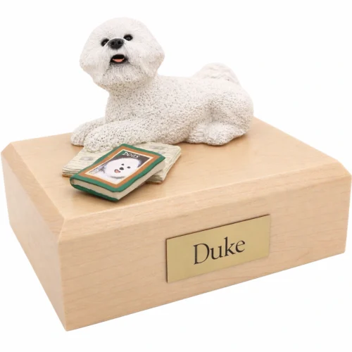 Memorial cremation urn with laying white Bichon Frise figurine, maple finish