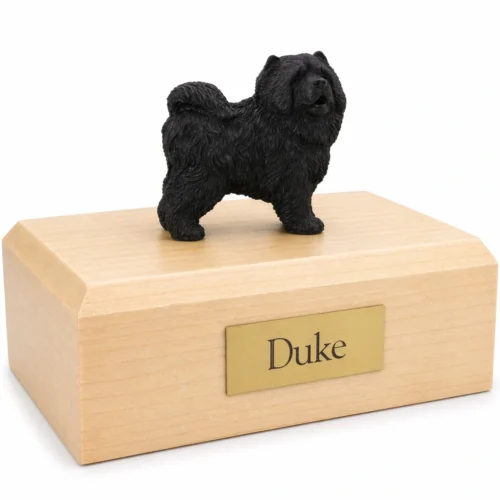 Memorial cremation urn with standing black Chow Chow dog figurine, maple finish