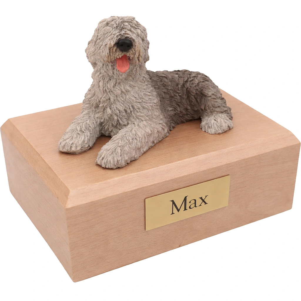 Memorial cremation urn with laying Sheepdog dog figurine, maple finish