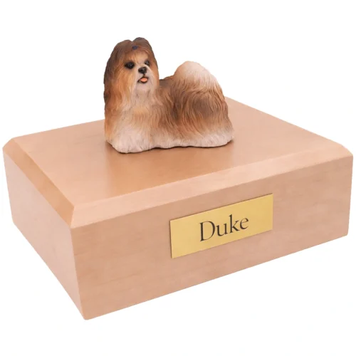 Memorial cremation urn with standing red and white Shih Tzu dog figurine, maple finish