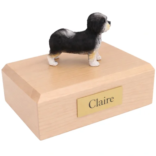 Memorial cremation urn with standing black and white Puppycut Shih Tzu dog figurine, maple finish