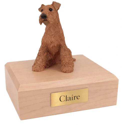 Memorial cremation urn with sitting Airedale dog figurine, maple finish