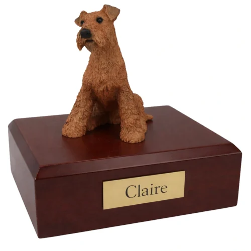 Memorial cremation urn with sitting Airedale dog figurine, walnut finish