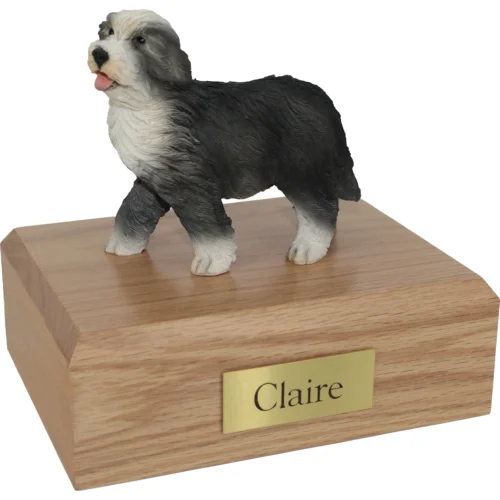 Memorial cremation urn with Bearded Collie dog figurine, oak finish