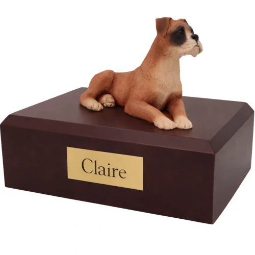 Memorial cremation urn with laying ears down Boxer dog figurine, walnut finish