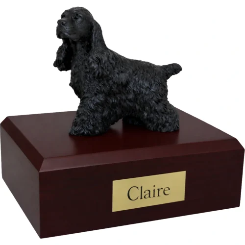 Memorial cremation urn with standing black Cocker Spaniel dog figurine, walnut finish