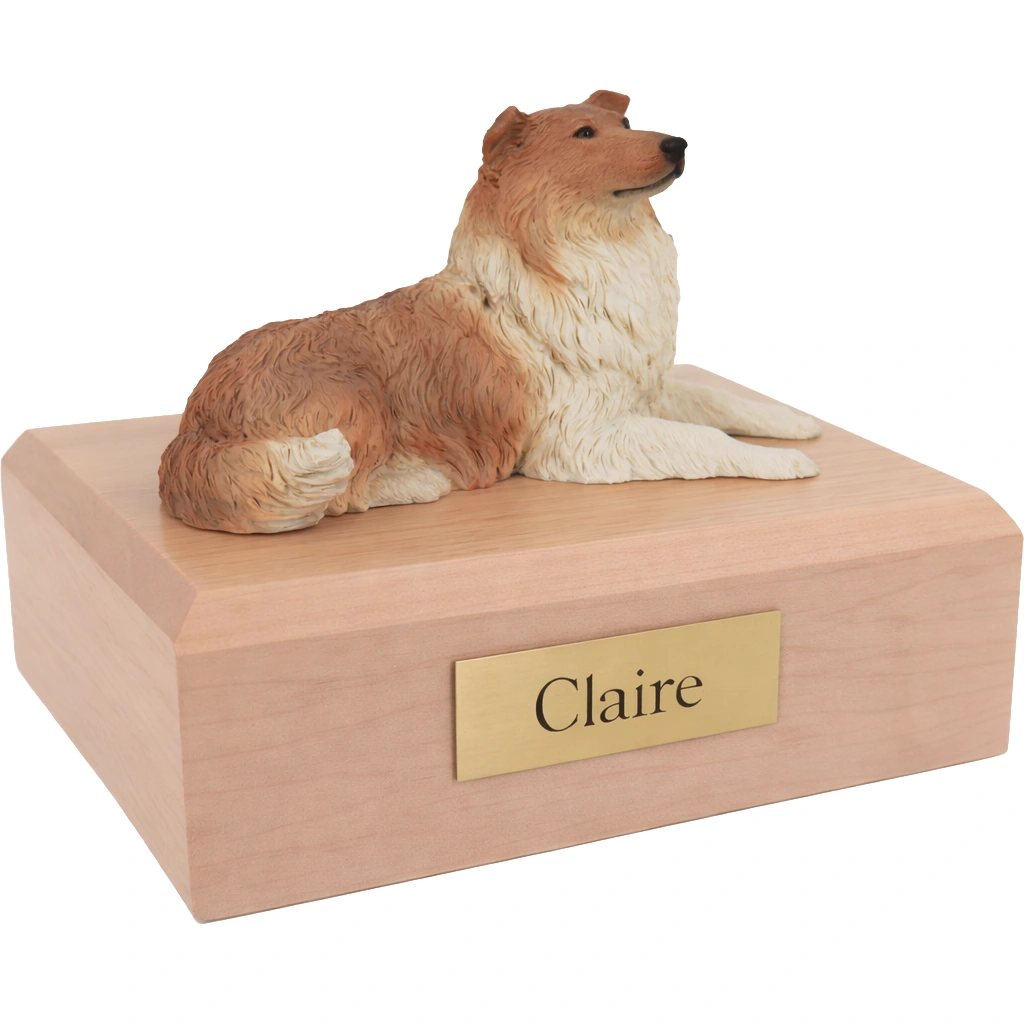 Memorial cremation urn with laying Collie dog figurine, maple finish