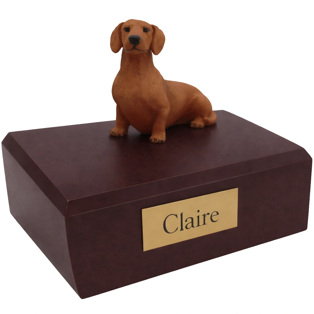 Memorial cremation urn with sitting red Dachshund dog figurine, walnut finish
