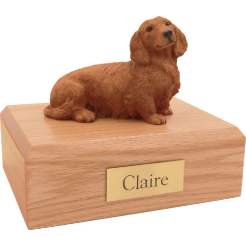 Memorial cremation oak finish urn with sitting longhaired red Dachshund dog figurine