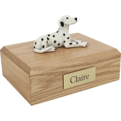 Memorial cremation urn with laying Dalmatian dog figurine, oak finish