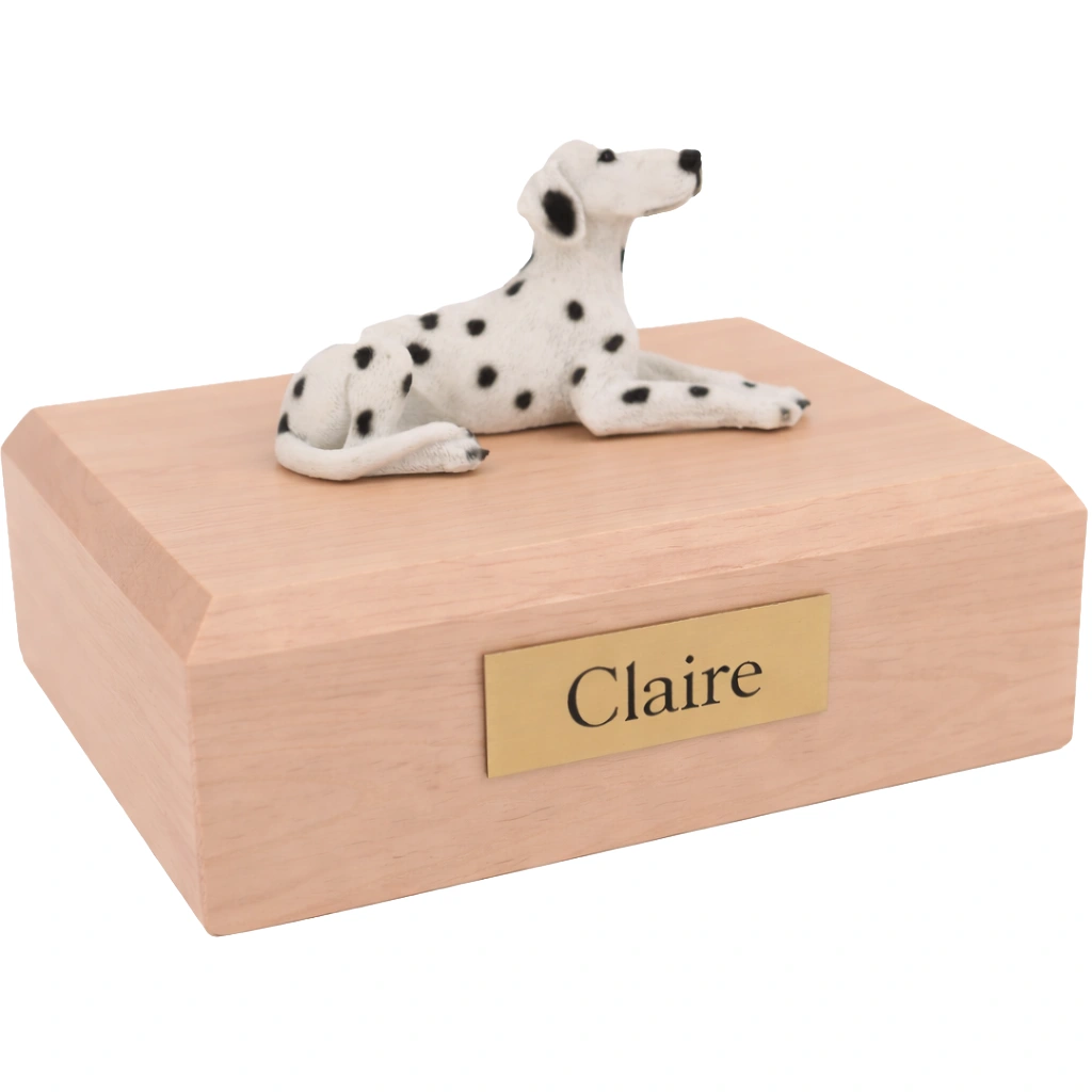 Memorial cremation urn with laying Dalmatian dog figurine, maple finish