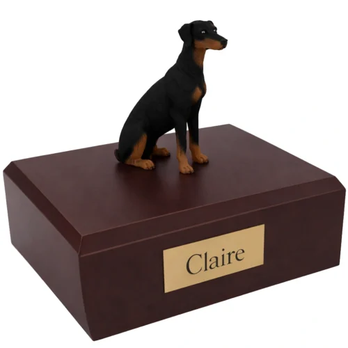 Memorial cremation urn with sitting ears down Doberman Pinscher dog figurine, walnut finish