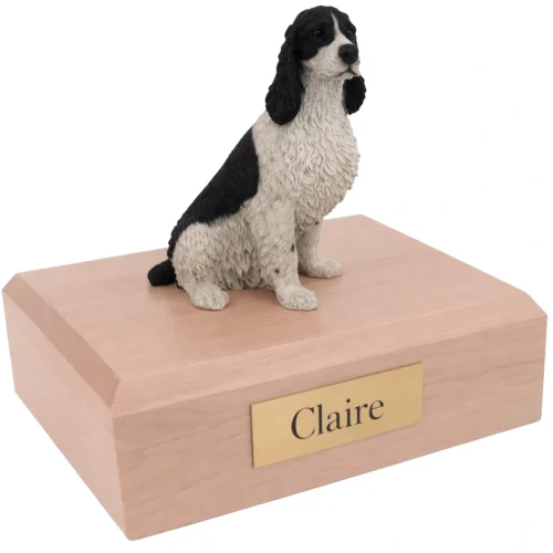 Memorial cremation urn with sitting Springer Spaniel dog figurine, maple finish