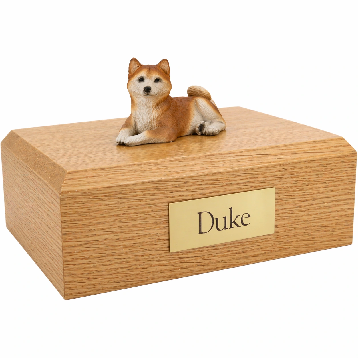 Memorial cremation urn with laying red and white Husky dog figurine, oak finish