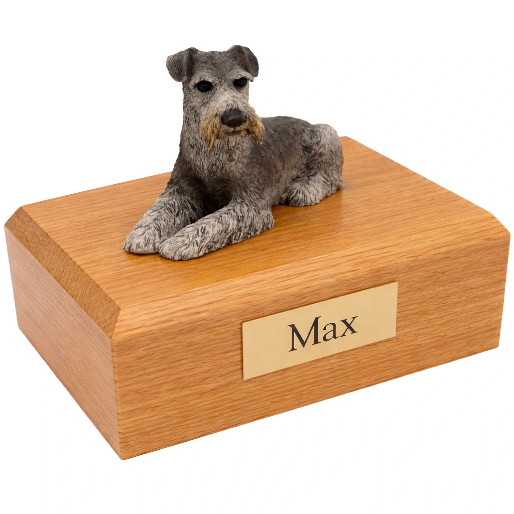 Memorial cremation urn with laying ears down Schnauzer dog figurine, oak finish
