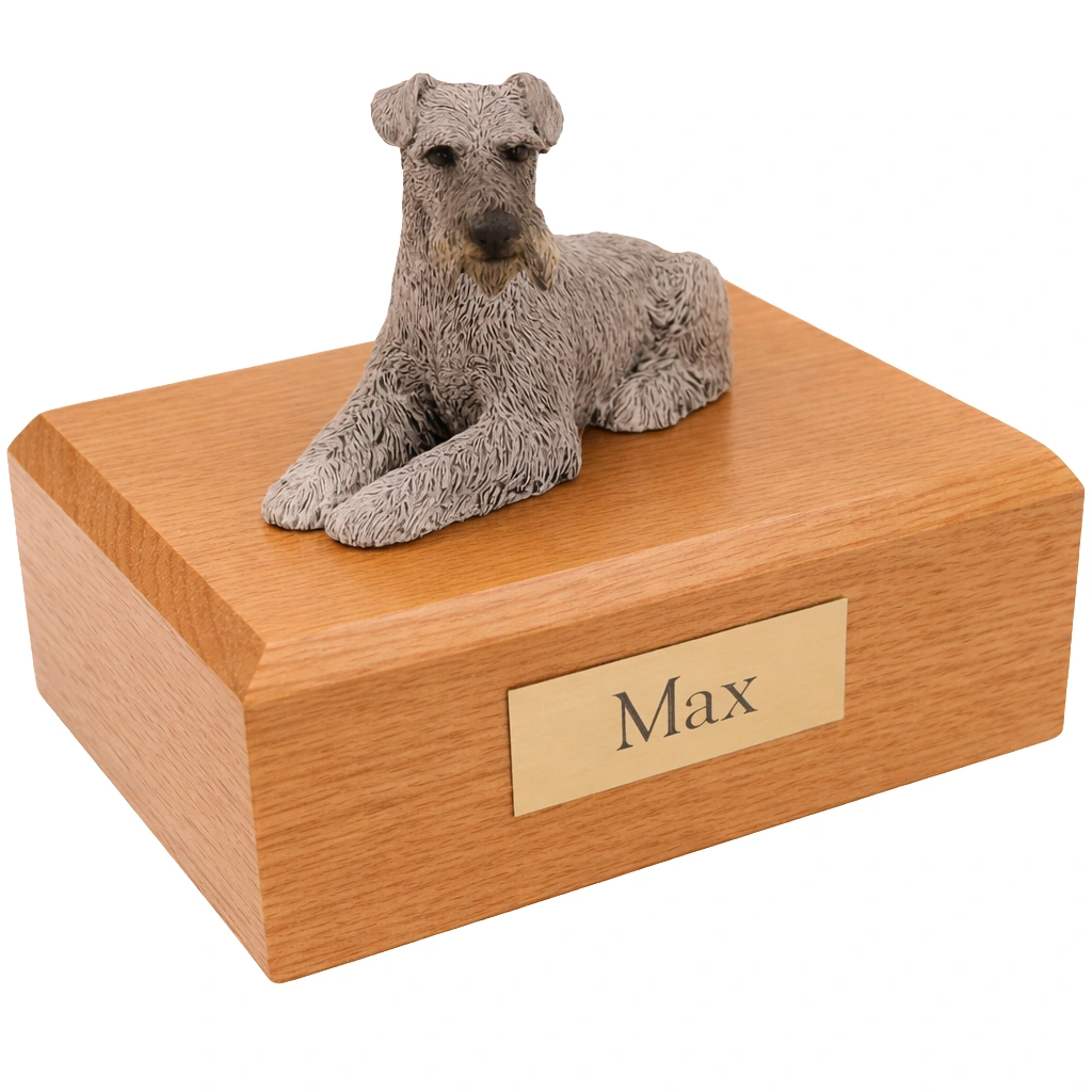 Memorial cremation urn with laying ears down silver Schnauzer dog figurine, oak finish
