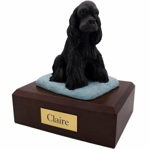Memorial cremation urn with sitting black Cocker Spaniel dog figurine, walnut finish