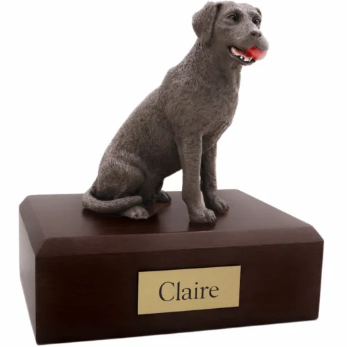 Memorial cremation urn with brown Labrador Retriever with ball dog figurine, walnut finish