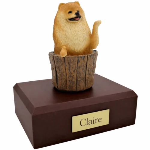 Memorial cremation urn with red tan Pomeranian dog figurine, walnut finish