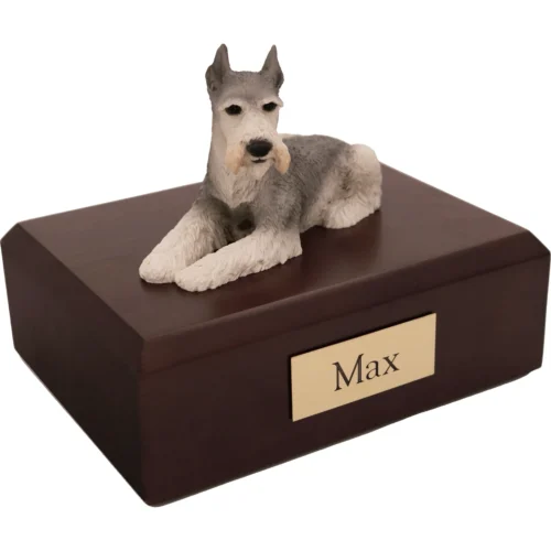 Memorial cremation urn with laying ears up tari Schnauzer dog figurine, walnut finish