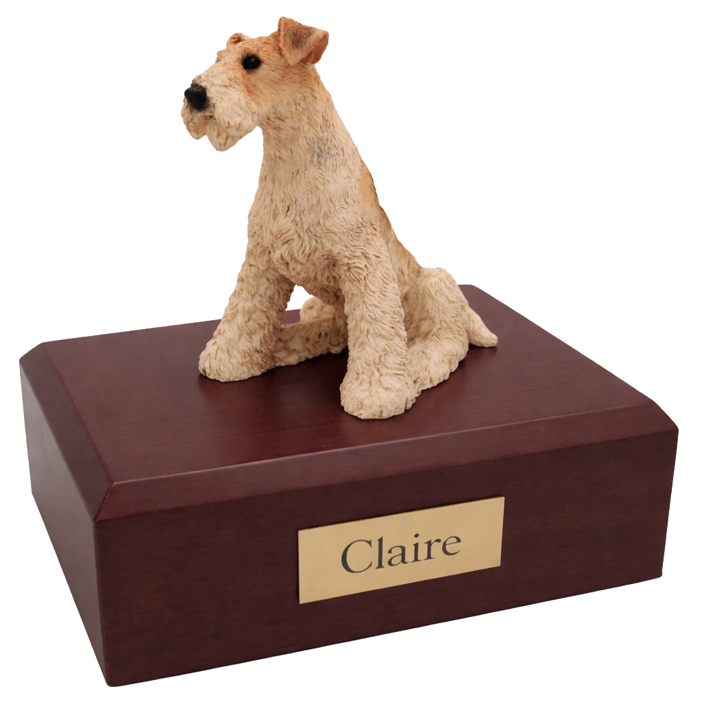 Memorial cremation urn with sitting Fox Terrier dog figurine, walnut finish