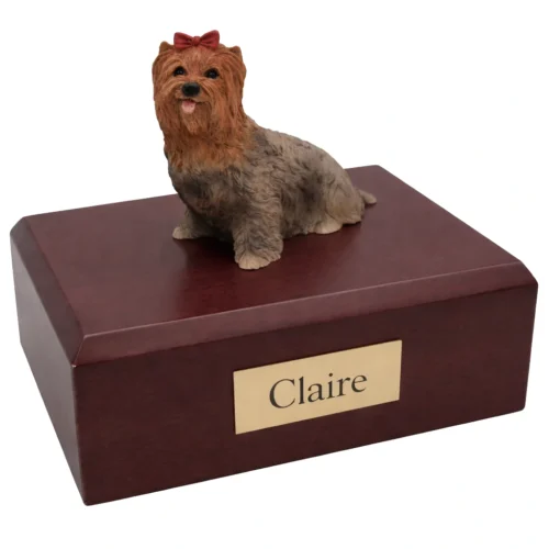 Memorial cremation urn with sitting Yorkshire Terrier dog figurine, walnut finish