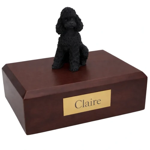Memorial cremation urn with sitting black Poodle dog figurine, walnut finish