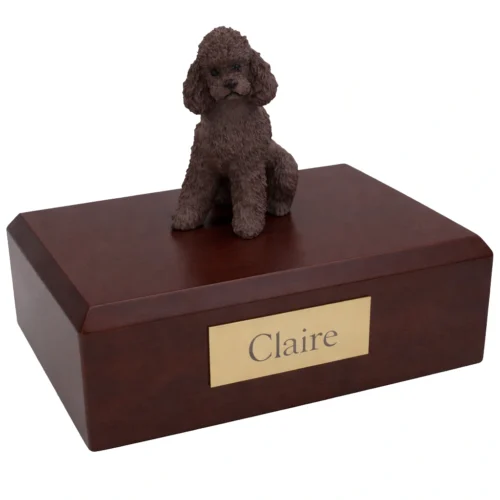 Memorial cremation urn with sitting chocolate Poodle dog figurine, walnut finish