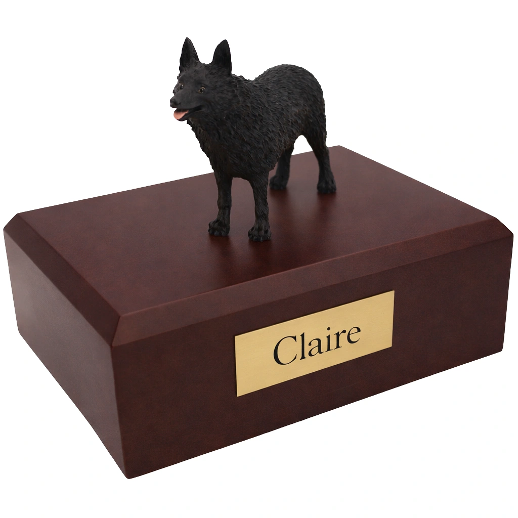 Memorial cremation urn with standing Schipperke dog figurine, walnut finish