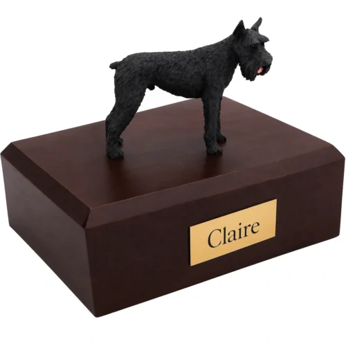 Memorial cremation urn with standing black Giant Schnauzer dog figurine, walnut finish