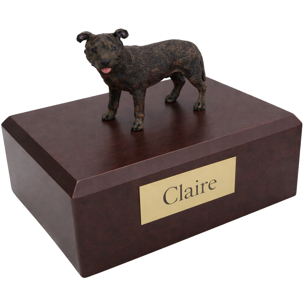 Memorial cremation urn with standing Staffordshire Bull Terrier dog figurine, walnut finish