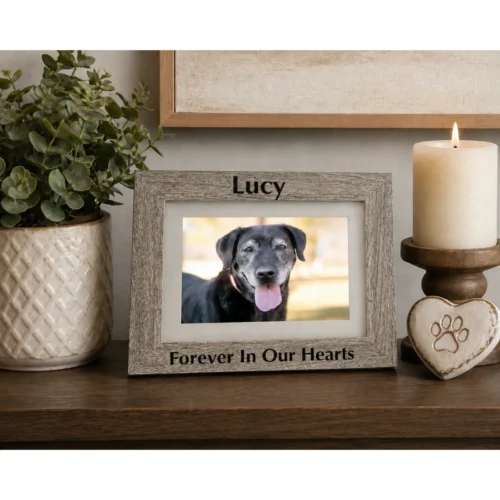 Engraved pet memorial photo frame in gray woodgrain finish. Holds 4x6 or 5x7 photo, engraved block with black fill, horizontal orientation, on shelf