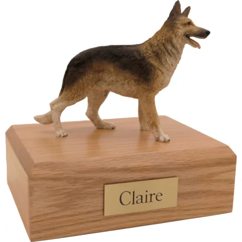 Memorial cremation urn with standing German Shepherd dog figurine, oak finish