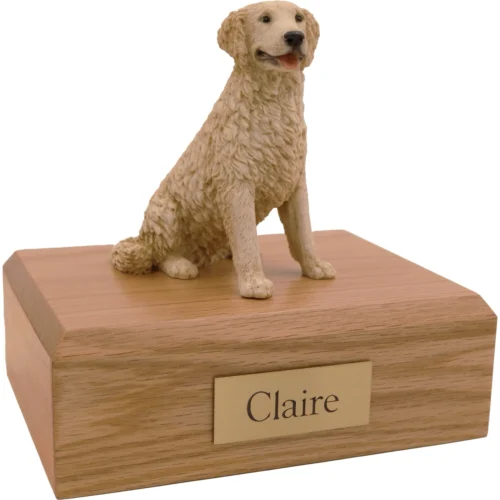Memorial cremation urn with sitting Blonde Golden Retriever dog figurine, oak finish