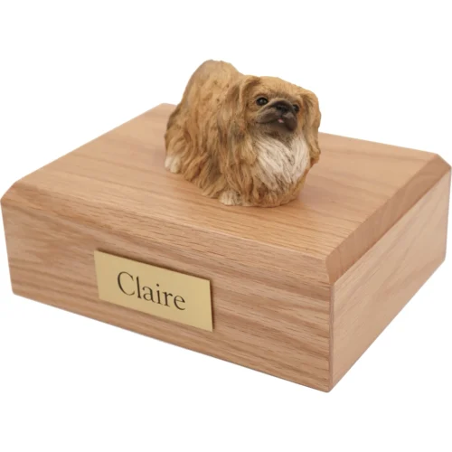 Memorial cremation urn with tan Pekingese dog figurine, oak finish