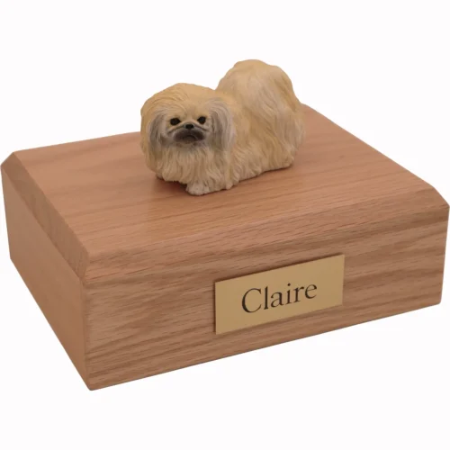 Memorial cremation urn with Pekingese dog figurine, oak finish