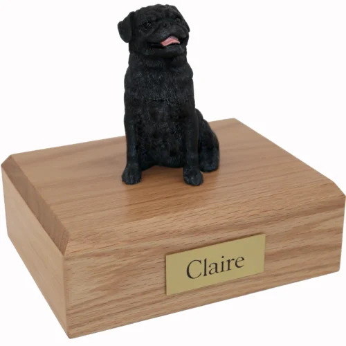 Memorial cremation urn with sitting black Pug dog figurine, oak finish